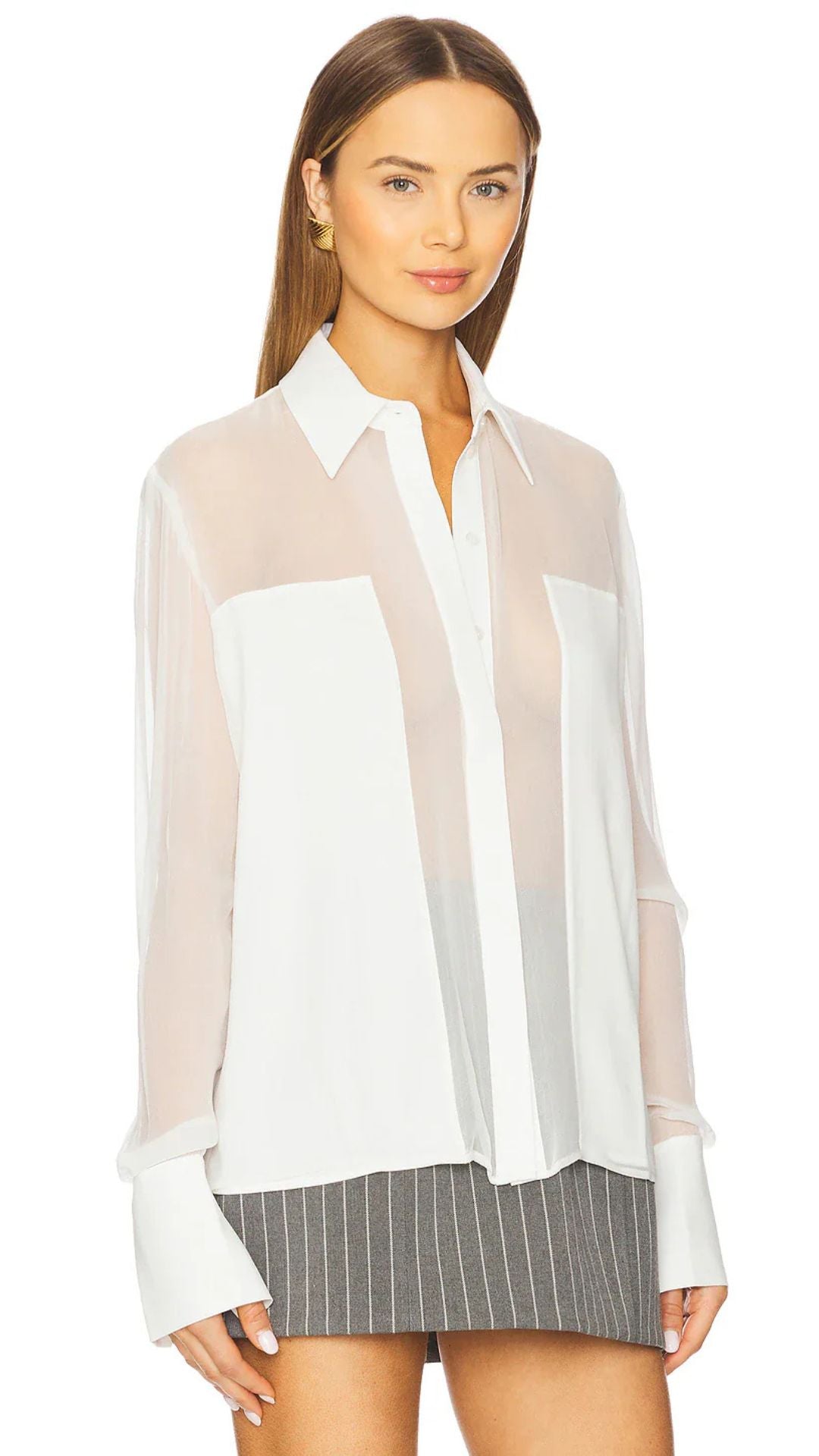 Woman wearing a sheer white blouse with a gray pinstripe skirt - Flore Silk Shirt - Sans Faff